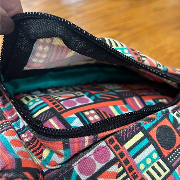 Kavu sling bag backpack in geometric print of Spring Montage.  Good condition. main image 6